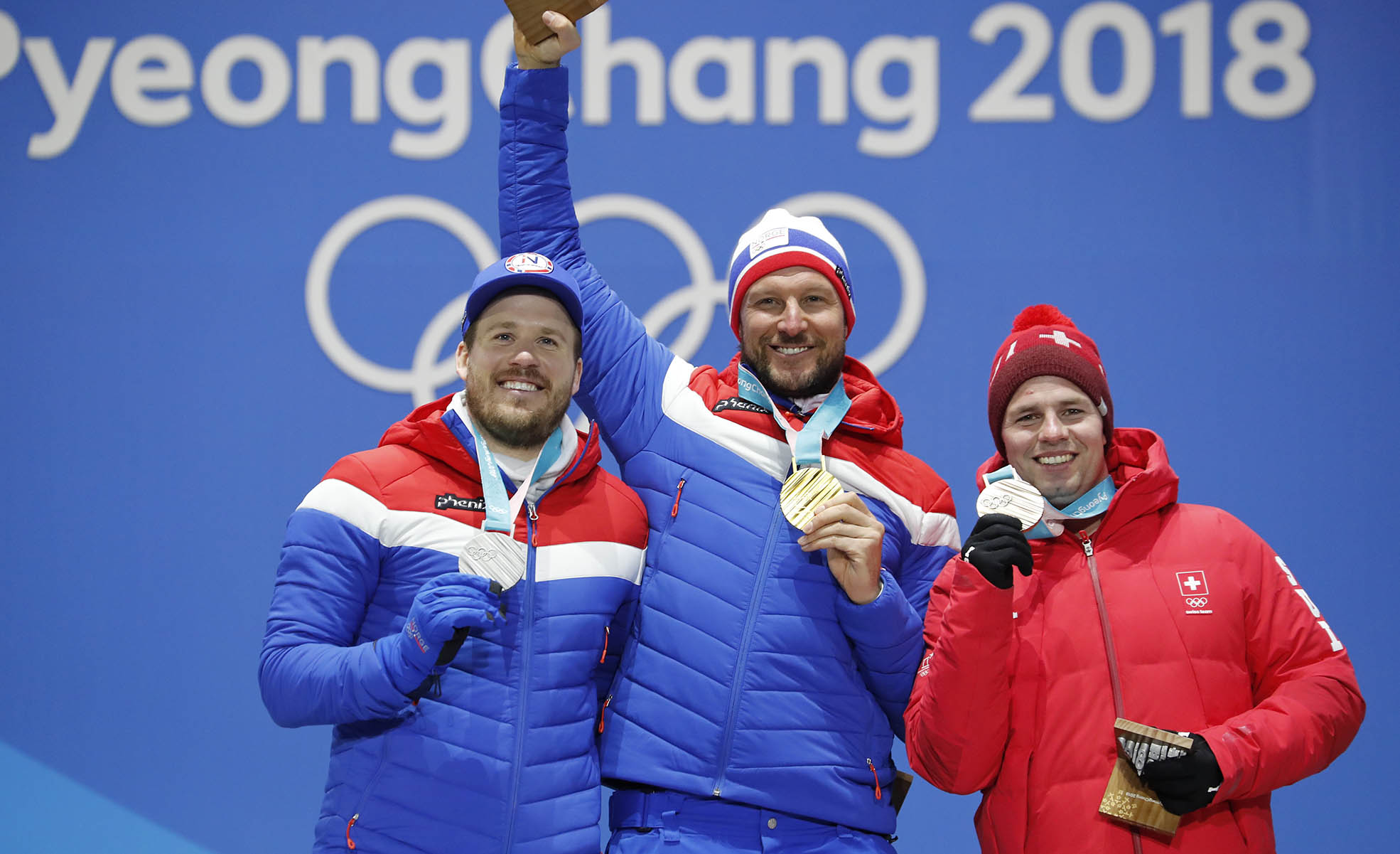 Norges idrettsforbunds utøverkomité ønsker ikke at det åpnes for politiske markeringer på den olympiske seierspallen. Her er Aksel Lund Svindal og Kjetil Jansrud (t.v.) under OL i Pyeongchang i 2018. Foto: Cornelius Poppe / NTB